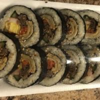 Kim Bap · Korean style sushi roll with beef, imitation crab, cucumber, fish cake, pickled radish,egg a...