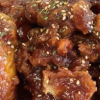 Korean Chicken Wings · Double deep fried wings, green onion spicy sweet gochujang (hot pepper paste).