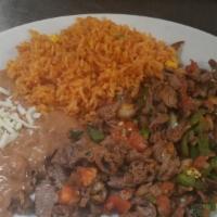 Bistec A La Mexicana · Grilled steak with onions, tomato, jalapeno peppers. Served with rice and beans. Choice of t...
