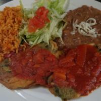 Chiles Relleno · Poblano peppers stuffed with cheese. Served with rice and beans.
