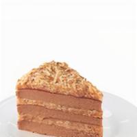German Chocolate Cake · Three layers of chocolate cake filled with an icing of caramel coconut, pecans and sided wit...