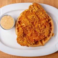 Chicken + Waffles · Our home-made Belgian waffle topped with southern0style fried chicken breast + our home-made...