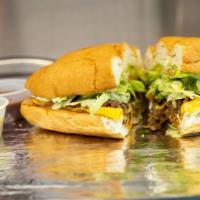 Torta De Azada / Steak Torta · Our tortas are come on a torta bread with refried beans, mayonnaise, guacamole, onions, toma...