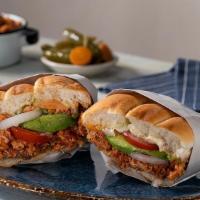 Torta De Chorizo / Mexican Sausage Torta · Our tortas are come on a torta bread with refried beans, mayonnaise, guacamole, onions, toma...