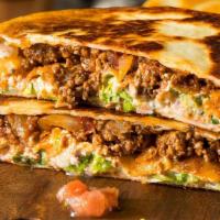 Quesadilla · Our Quesadilas are made on a flour tortilla with cheese and your Choice of meat and a salad ...