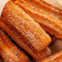 Churros · Churros are a delicious deep fry Mexican dessert made from flour and sprinkle with cinnamon ...