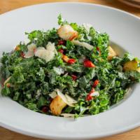 Kale Caesar · Kale, sun-dried tomatoes, garlic croutons, Wisconsin parmesan, and dry hopped lemon anchovy ...