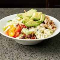 Cali Chopped Salad · Hass avocado, chicken, gorgonzola, peppered bacon, grape tomatoes, provolone, cucumber, carr...