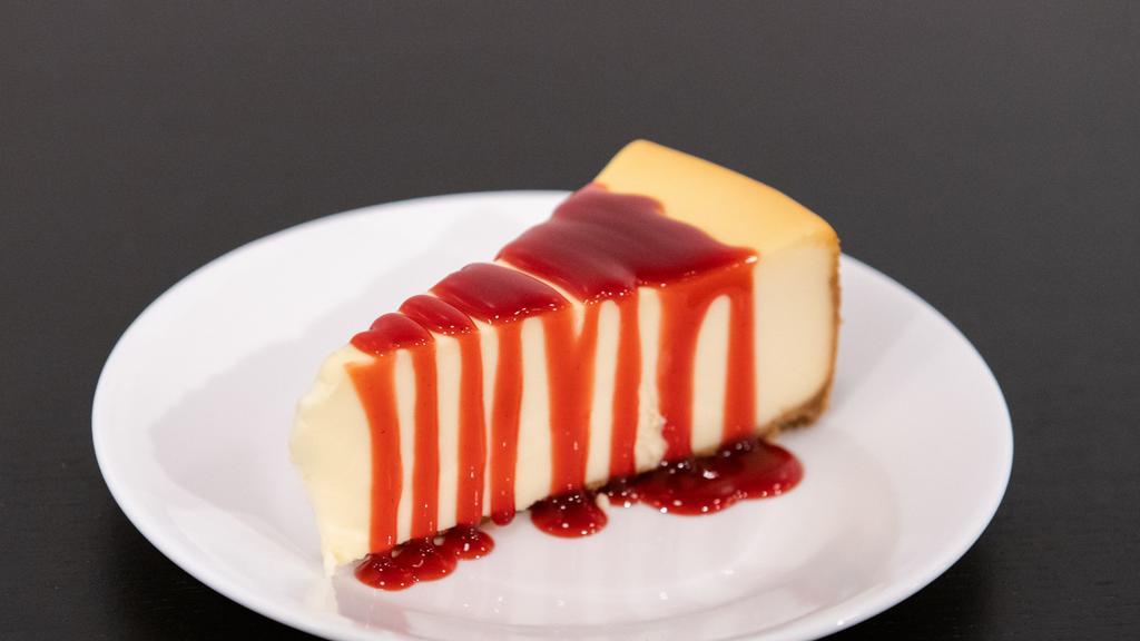 New York Style Cheesecake · A luscious, rich and sweet slice of New York style cheesecake.