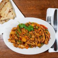 Chicken Suqaar & Malawax · Chicken Suqaar: cubes of chicken breast cooked with vegetables and spices;
Malawax: thin bre...
