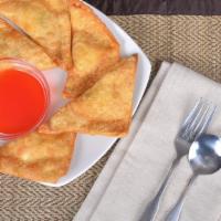 Crab Rangoon · (5 )  Crab meat and cream cheese ,green onion wrap in wonton skin and deep fried. Served wit...