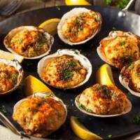 Steamed Clams · Canadian  clams, served with chorizo, red peppers and a white wine reduction.