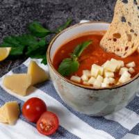 Gazpacho  · A cold tomato broth soup with cucumber and garlic.