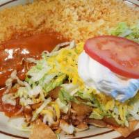 Enchiladas Verdes · Four (4) chicken enchiladas covered in salsa verde and served with lettuce, sour cream and t...