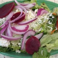 Greek Salad · Lettuce, tomatoes, cucumbers, beets, pepperoncini, Greek olives, onions, feta cheese & house...