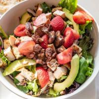 Strawberry Chicken Salad · Grilled chicken with mixed greens, strawberries, avocado, blue cheese, onions, candied pecan...