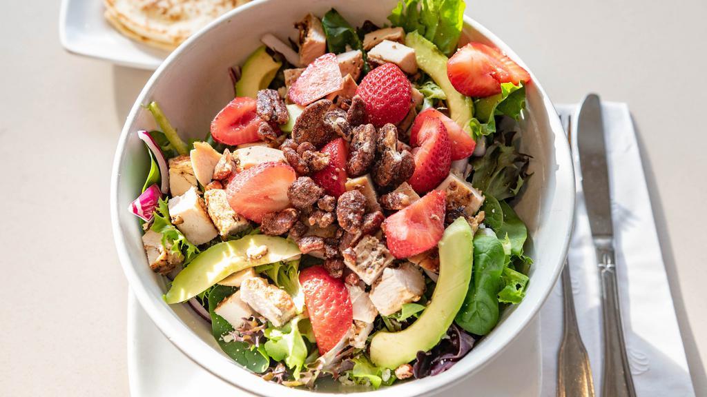 Strawberry Chicken Salad · Grilled chicken with mixed greens, strawberries, avocado, blue cheese, onions, candied pecans & citrus vinaigrette.