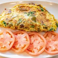 Vegetarian Omelette With Goat Cheese · Zucchini, mushrooms, green peppers, spinach, onions & goat cheese.