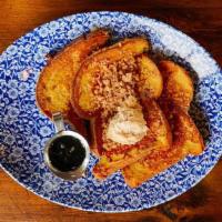 Cinnamon Streusel French Toast · Challah French toast, maple brown sugar butter, cinnamon streusel