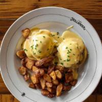 Traditional Benedict · Toasted English muffin, shaved ham, poached eggs*, house hollandaise, Hollander potatoes