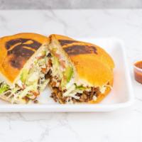 Tortas · Includes: lettuce, tomatoes, cheese, beans, sour cream and avocado.