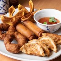 Appetizer Combo · Sampler plate with two vegetable balls, two spring rolls, two crab rangoon, and four pieces ...