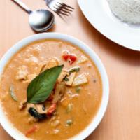 Pineapple Curry · Red curry paste, pineapple, bamboo shoots, bell peppers, Thai basil, and coconut milk.