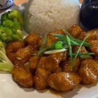 Crispy Chicken · Breaded chicken sautéed in sweet plum sauce. Served with steamed white rice and steamed broc...