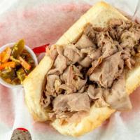 Italian Beef · Add mozzarella for an additional charge. And your choice of hot or sweet peppers.