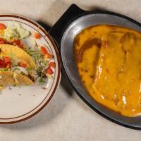 El Sombrero · Two enchiladas of choice, two beef crispy tacos.