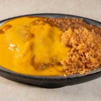 Tampico Dinner · Two  enchiladas covered with chilli and cheese sauce,  rice and beans.