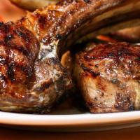 Lamb Chops · 3 pieces of lamb chops with starch and vegetables and zip sauce