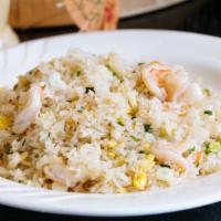 Shrimp · Fried rice with shrimp, egg, carrots, peas, garlic, and white and green onions.