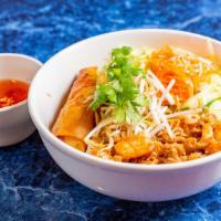 Vietnam Cafe'S Style · A combination of pork, shrimp, and egg roll with a salad of rice vermicelli noodles, lettuce...