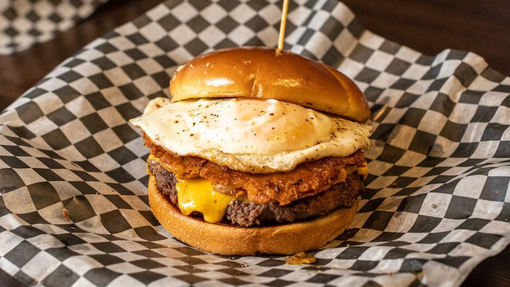 The Hangover Burger · Midwest Beef / Double American Cheese / Cheesy Hashbrowns / Fried Egg