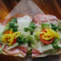 Italian Sub · Layers of salami and juicy ham topped with fresh mozzarella, lettuce, tomato, banana pepper,...