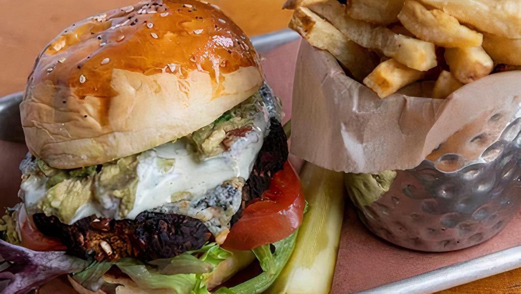 Spicy Black Bean Burger · Made with a chipotle black bean patty, pepper jack cheese, guacamole, lettuce, tomato, and jalapeno ranch dressing served with your choice of a house-made seeded brioche bun or Texas toast. Served with hand-cut fries