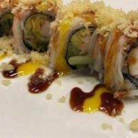 Cherry Blossom Roll (8) · Shrimp, cucumber, mango inside, topped with crabmeat, crunch with eel sauce and mango sauce.