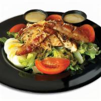Big Chicken Salad · Grilled or crispy chicken breast, greens, Cheddar-Jack, bacon, egg, tomato, choice of dressing