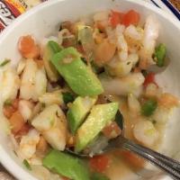Ceviche · Fresh shrimp,  with fresh tomatoes, onions, cilantro, avocados and jalapeños with freshsquee...