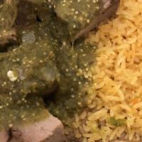 Tomatillo Verde · Succulent chunks of pork marinated in our famous tomatillo sauce, served with homemade torti...