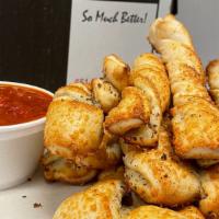 Bread Stix · 6 large fresh baked bread stix all twisted up with John's garlic & herb butter and Parmesan ...