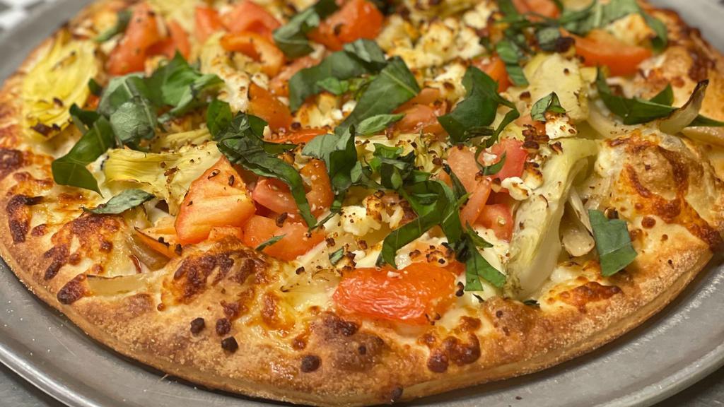 California Dreamer (14 Inch Large) · An olive oil brushed crust covered with fresh tomatoes, artichoke hearts, sautéed onions and mozzarella topped with a touch of feta cheese and fresh basil.