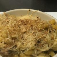 Kids Mac N' Cheese · Our kids portion of an old classic renewed at John's. Cavatappi pasta in a rich three cheese...