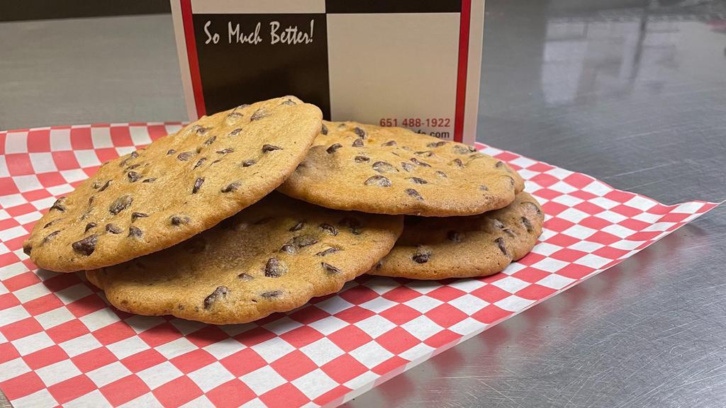 Chocolate Chip Cookie · Jumbo chocolate chip cookie. It's the real deal! 100% butter, brown sugar and milk chocolate chips. Just like you remember, but much bigger.