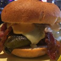 Green Chile Bacon Burger · Roasted green chiles, pepper jack, bacon, chipotle mayo. Same burger as before with bacon now.