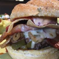 Hell'S Kitchen Burger · Sweet jalapeño onions, ghost pepper cheese, bacon, crushed tortilla chips, ranchero salsa, c...