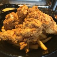 Chicken Tender Basket · Famously hand-breaded chicken tenders, flash-fried and served with fries.