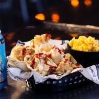 Flatire Famous Fish Tacos · Beer-battered tilapia with cabbage mix, chipotle tartar sauce, and a splash of sriracha in f...