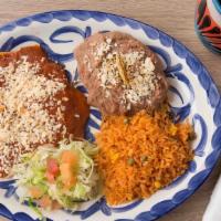 Huevos Rancheros · Three eggs over-easy with salsa.